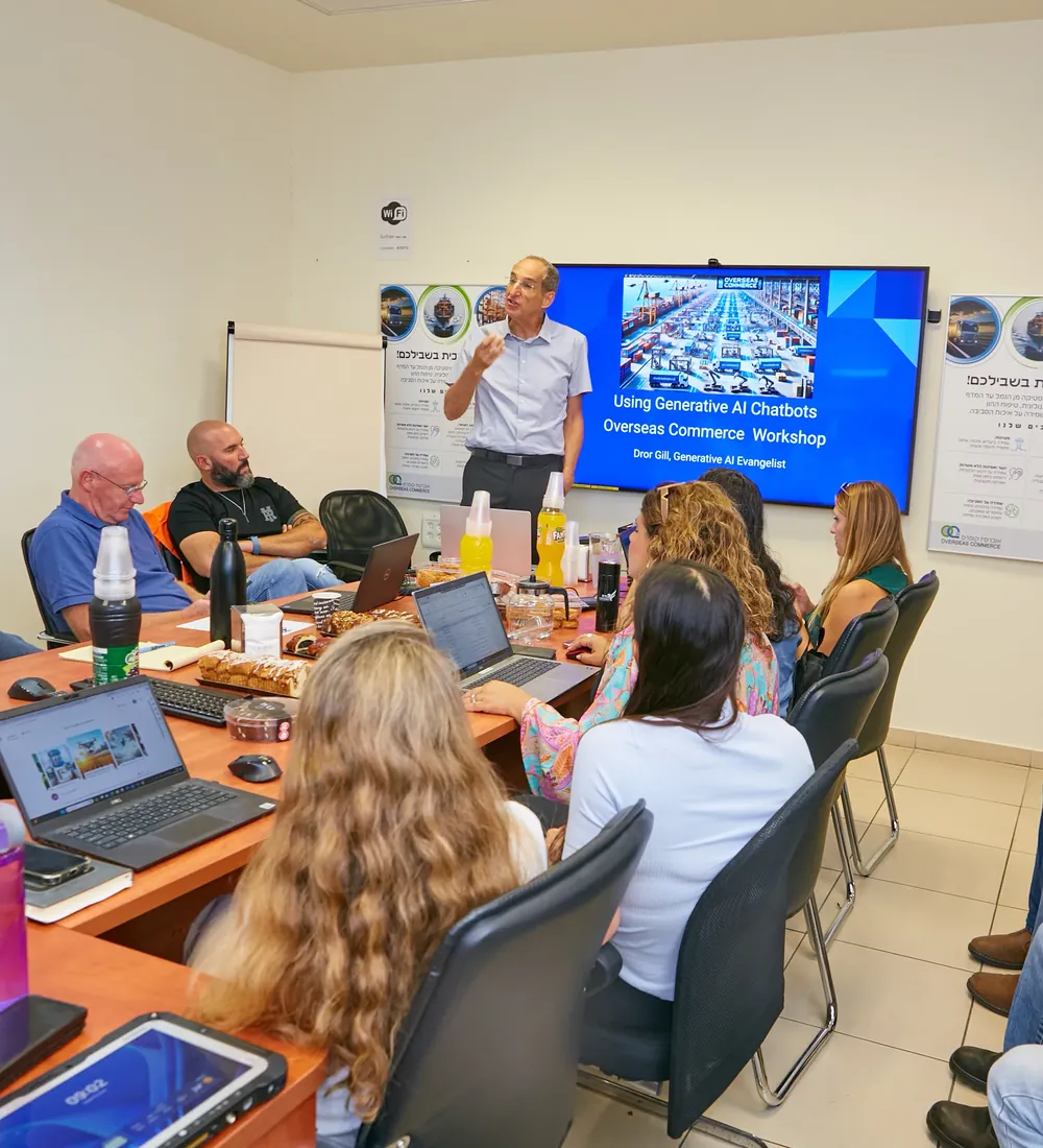 Dror Gill running a hands-on AI workshop for a client team